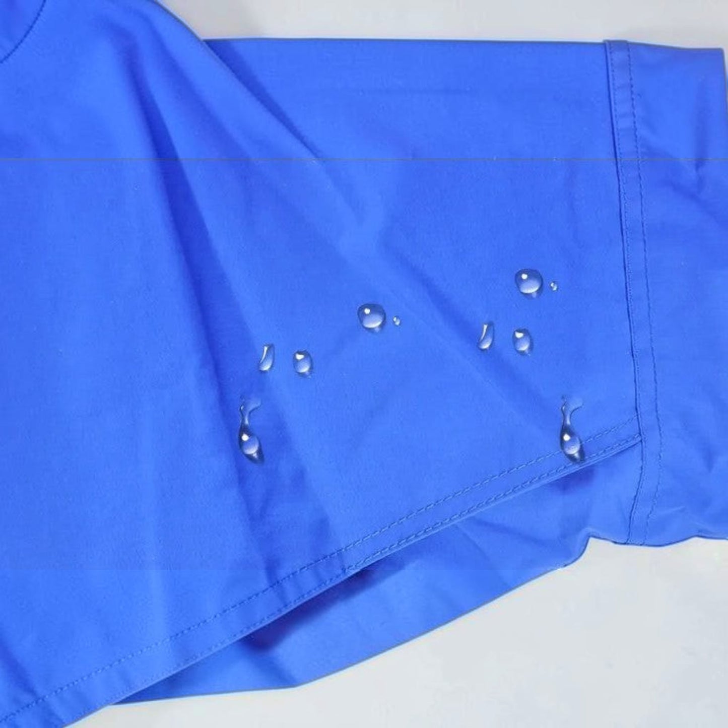 GERF® Certified Cryogenic Gloves, traje azul impermeable y transpirable para protección en entornos de ultrafrío.